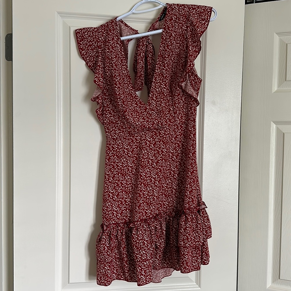 BRAND NEW short red romper size medium!